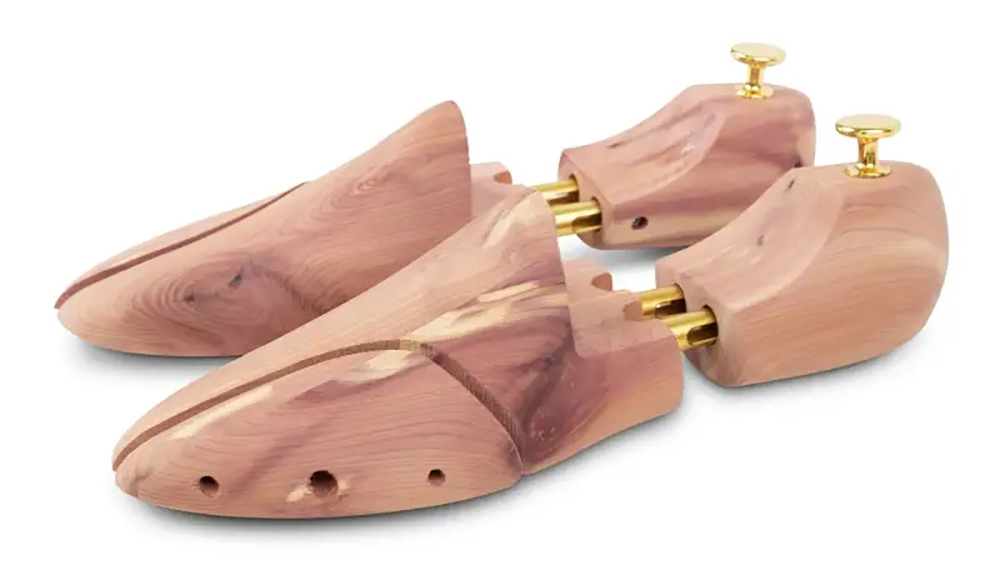Hjælpe mod smert i fødder under vandring, sko-, støvleblokker i træ, til opbevaring af Erik B. Jørgensen